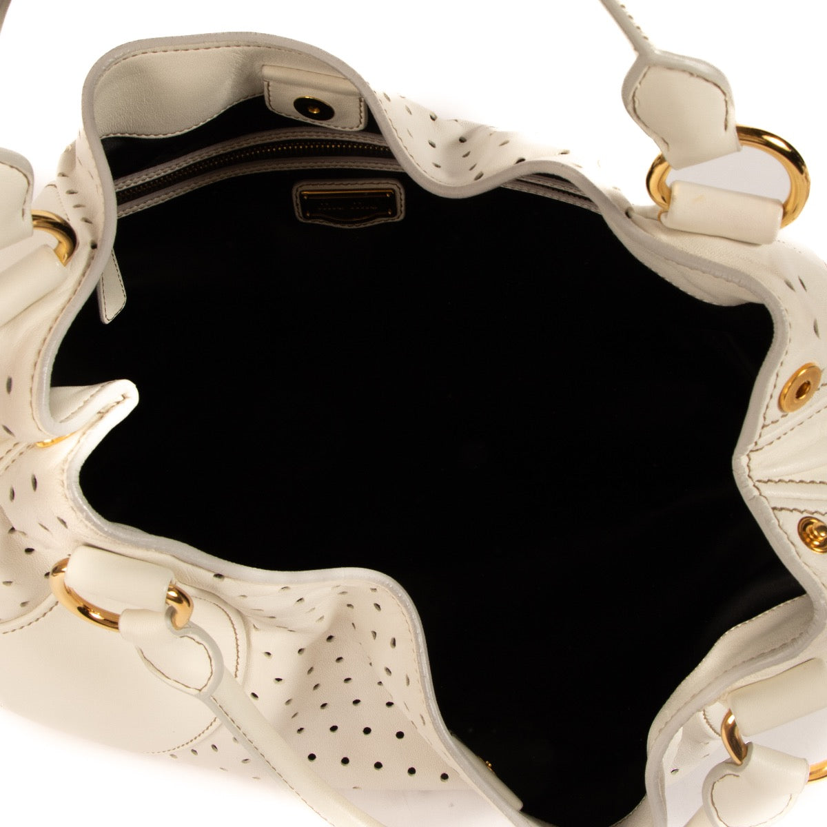 Shop safe online at Labellov in Antwerp, Brussels and Knokke this 100% authentic second hand Miu Miu White Perforated Large Hobo Bag