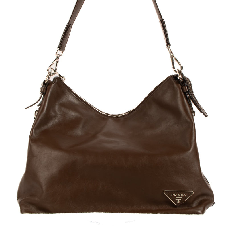 Shop safe online at Labellov in Antwerp, Brussels and Knokke this 100% authentic second hand Prada Brown Cervo Leather Hobo Bag