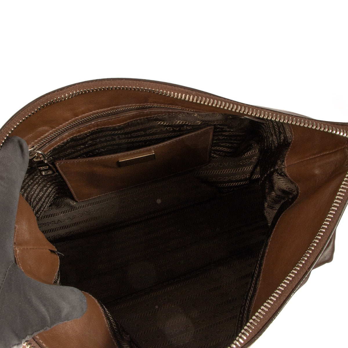 Shop safe online at Labellov in Antwerp, Brussels and Knokke this 100% authentic second hand Prada Brown Cervo Leather Hobo Bag