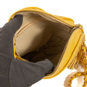 Shop safe online at Labellov in Antwerp, Brussels and Knokke this 100% authentic second hand Chanel Vintage Yellow Quilted Round Crossbody Bag