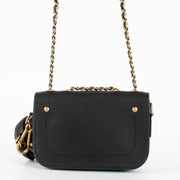 Authentic pre-loved Chanel Classic Black Calfskin Flap Bag with Pouch on Labellov.com