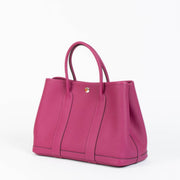 Shop this 100% authentic Hermès Garden Party 30 Rouge Pourpre Negonda PHW Bag at Labellov.com