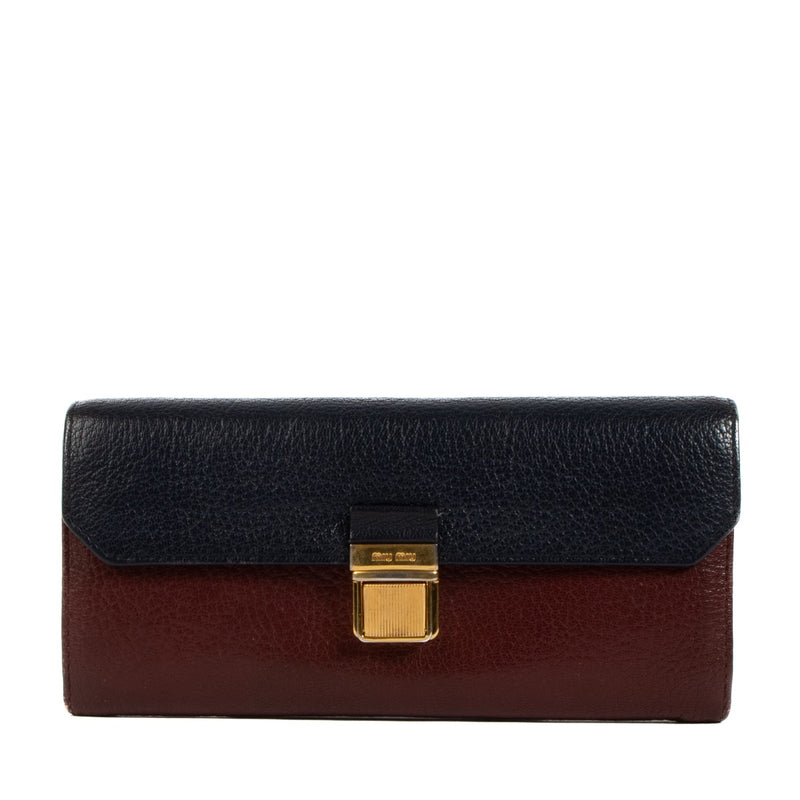 Shop safe online at Labellov in Antwerp, Brussels and Knokke this 100% authentic second hand Miu Miu Blue and Burgundy Long Wallet