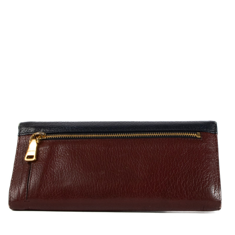 Shop safe online at Labellov in Antwerp, Brussels and Knokke this 100% authentic second hand Miu Miu Blue and Burgundy Long Wallet
