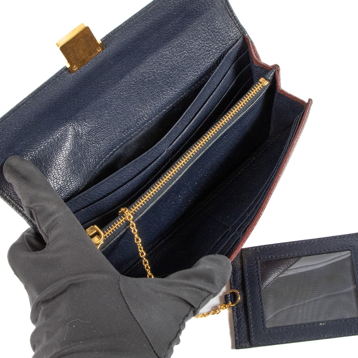 Shop safe online at Labellov in Antwerp, Brussels and Knokke this 100% authentic second hand Miu Miu Blue and Burgundy Long Wallet