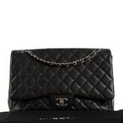 Shop safe online at Labellov in Antwerp, Brussels and Knokke this 100% authentic second hand Chanel Black Caviar Maxi Classic Single Flap Bag