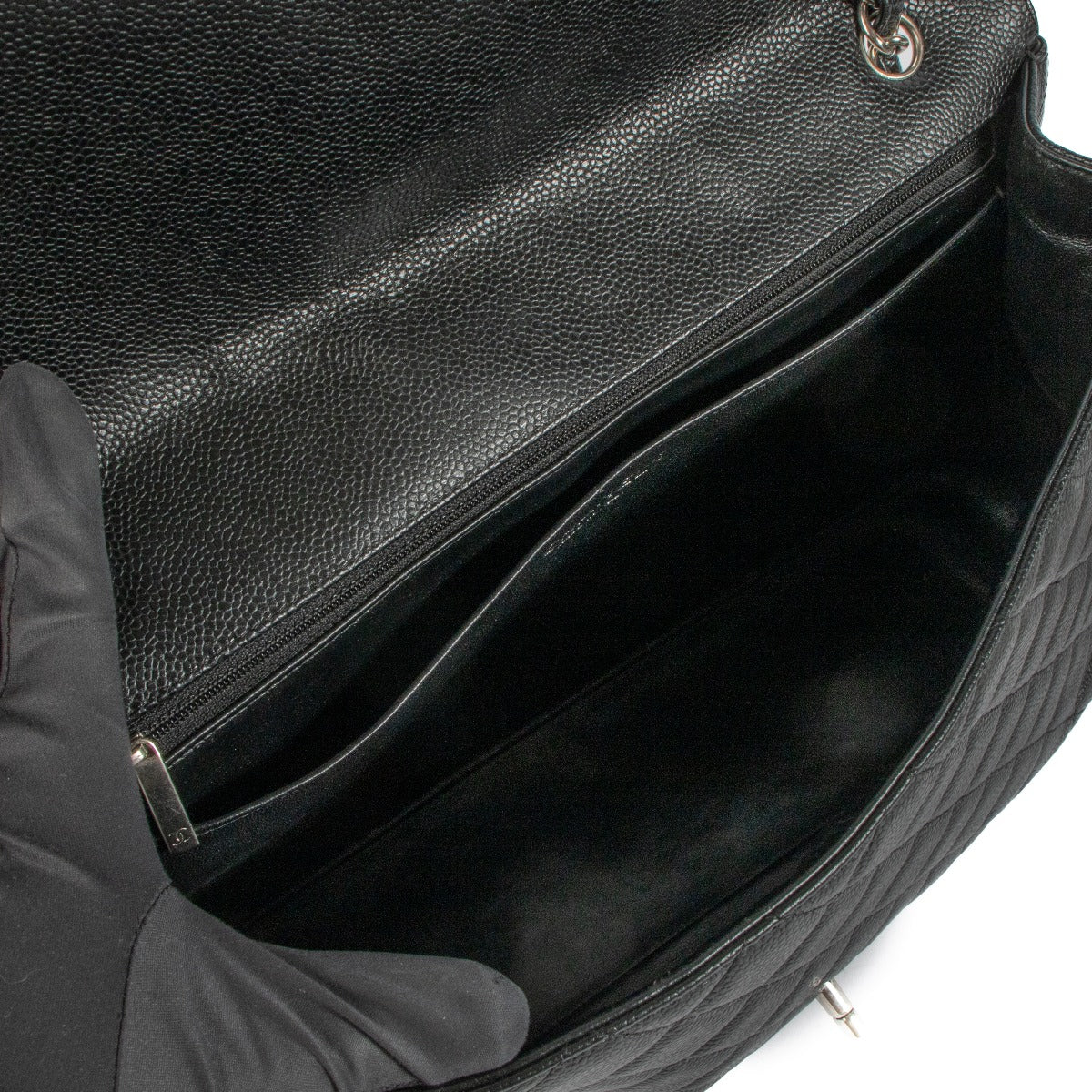 Shop safe online at Labellov in Antwerp, Brussels and Knokke this 100% authentic second hand Chanel Black Caviar Maxi Classic Single Flap Bag
