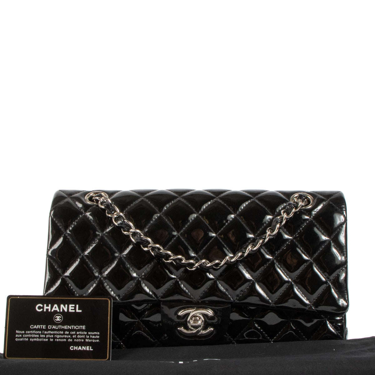 Shop safe online at Labellov in Antwerp, Brussels and Knokke this 100% authentic second hand Chanel Black Patent Leather Medium Classic Flap Bag