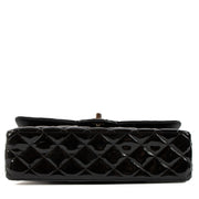 Shop safe online at Labellov in Antwerp, Brussels and Knokke this 100% authentic second hand Chanel Black Patent Leather Medium Classic Flap Bag