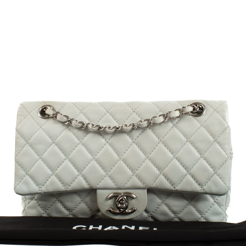 Shop safe online at Labellov in Antwerp, Brussels and Knokke this 100% authentic second hand Chanel Baby Blue Caviar Leather Medium Classic Flap Bag