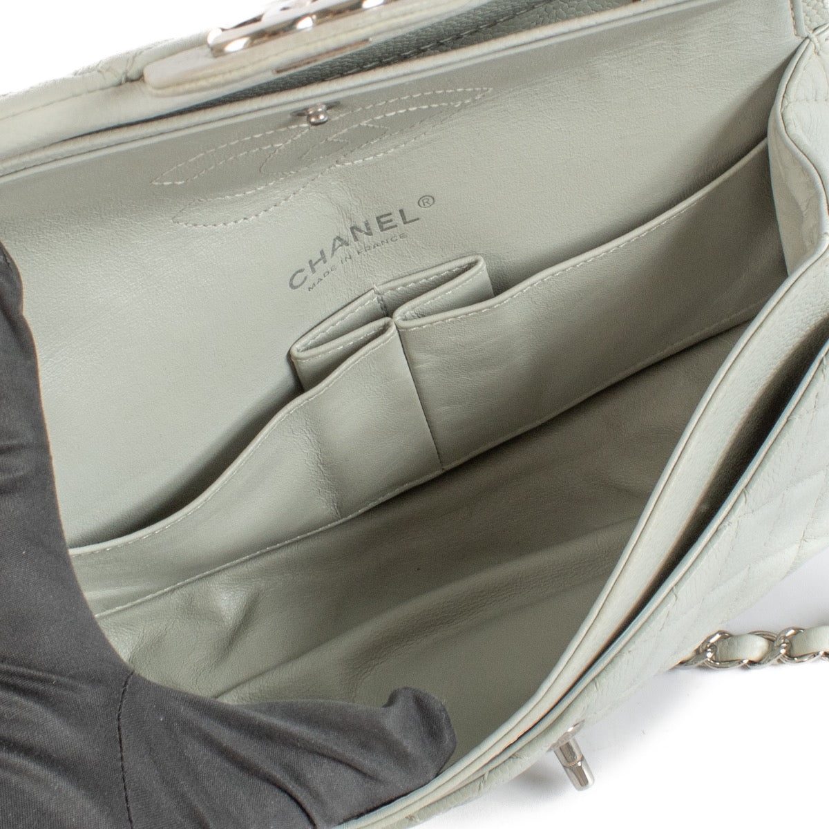 Shop safe online at Labellov in Antwerp, Brussels and Knokke this 100% authentic second hand Chanel Baby Blue Caviar Leather Medium Classic Flap Bag