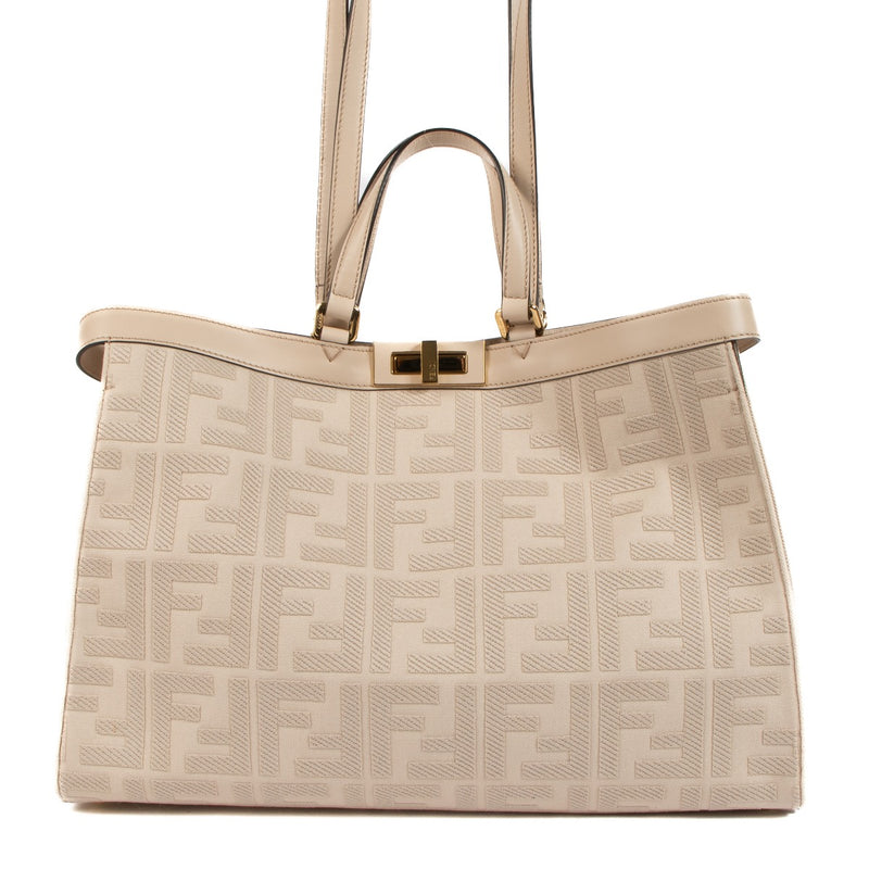 Shop safe online at Labellov in Antwerp, Brussels and Knokke this 100% authentic second hand Fendi Pink Canvas Vitello King Medium Peekaboo X-Tote Bag