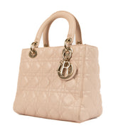 Christian Dior Lady Dior Rose Poudre Fabric Top Handle Bag for the best price at Labellov secondhand luxury in Antwerp. We buy and sell your preloved and new designer bags for the best price at Labellov secondhand luxury in Antwerp. Koop en verkoop uw aut