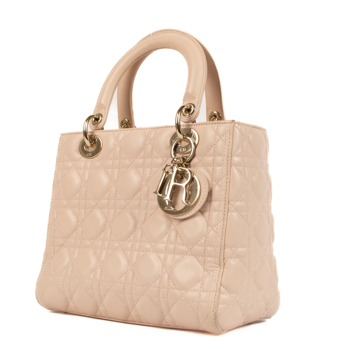 Christian Dior Lady Dior Rose Poudre Fabric Top Handle Bag for the best price at Labellov secondhand luxury in Antwerp. We buy and sell your preloved and new designer bags for the best price at Labellov secondhand luxury in Antwerp. Koop en verkoop uw aut