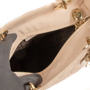 Christian Dior Lady Dior Rose Poudre Fabric Top Handle Bag for the best price at Labellov secondhand luxury in Antwerp. We buy and sell your preloved and new designer bags for the best price at Labellov secondhand luxury in Antwerp. Koop en verkoop uw aut