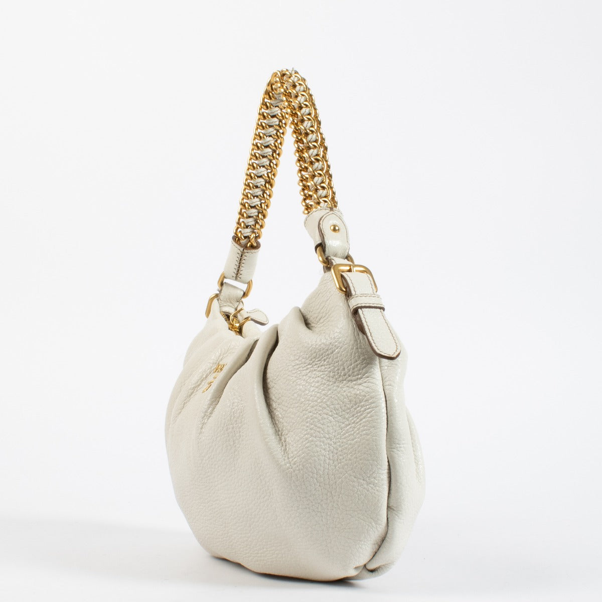 Prada White Shoulder Bag in soft leather with gold chain handle. A refined and versatile Prada design in very good pre-loved condition.