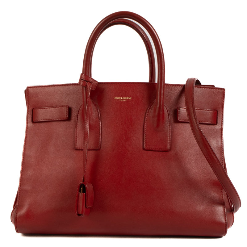 Saint Laurent Red Sac De Jour Small Handbag for the best price at Labellov secondhand luxury in Antwerp. Buy, sell and love your bags bought at Labellov. Worldwide shipping.