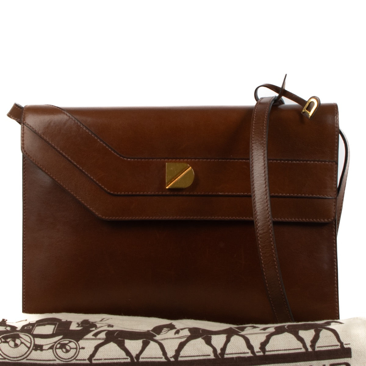 Delvaux Brown Leather Vintage D Shoulder Bag for the best price at Labellov secondhand luxury in Antwerp. Buy, sell and love your bags bought at Labellov. Worldwide shipping.