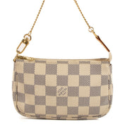 Shop safe online at Labellov in Antwerp, Brussels and Knokke this 100% authentic second hand Louis Vuitton Damier Azur Canvas Mini Pochette Accessoires Bag