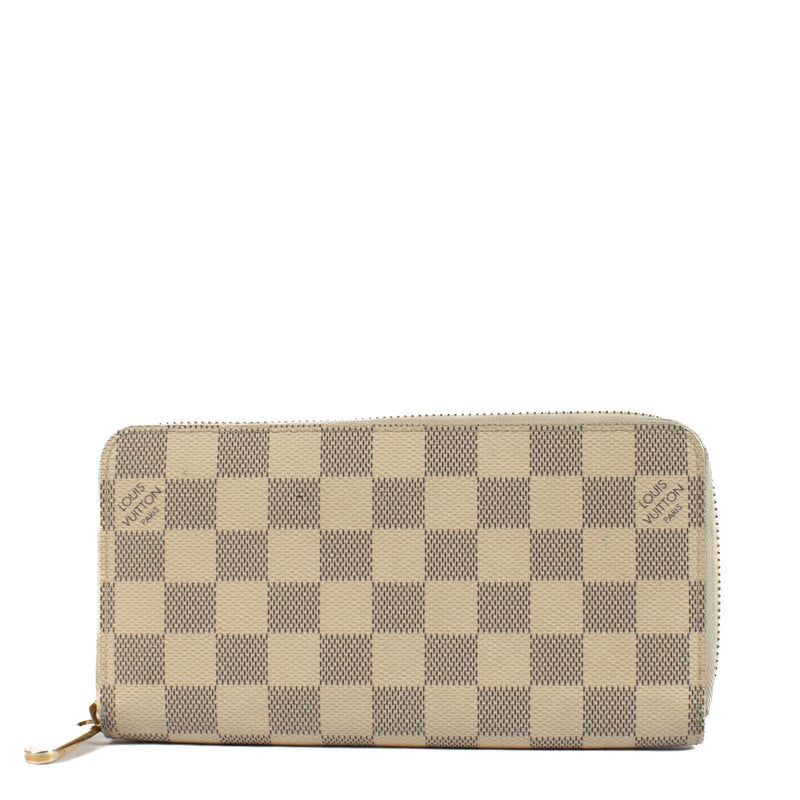 Shop 100% authentic Louis Vuitton Zippy Damier Azur Canvas Wallet at Labellov.com.