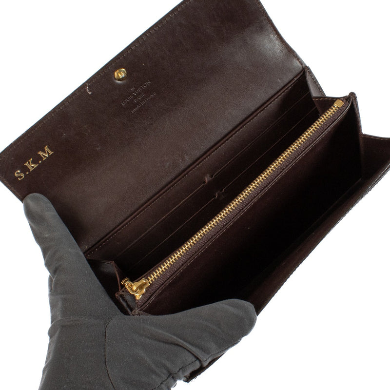Shop 100% authentic Louis Vuitton Sarah Terre d'Ombre Monogram Vernis Wallet at Labellov.com.