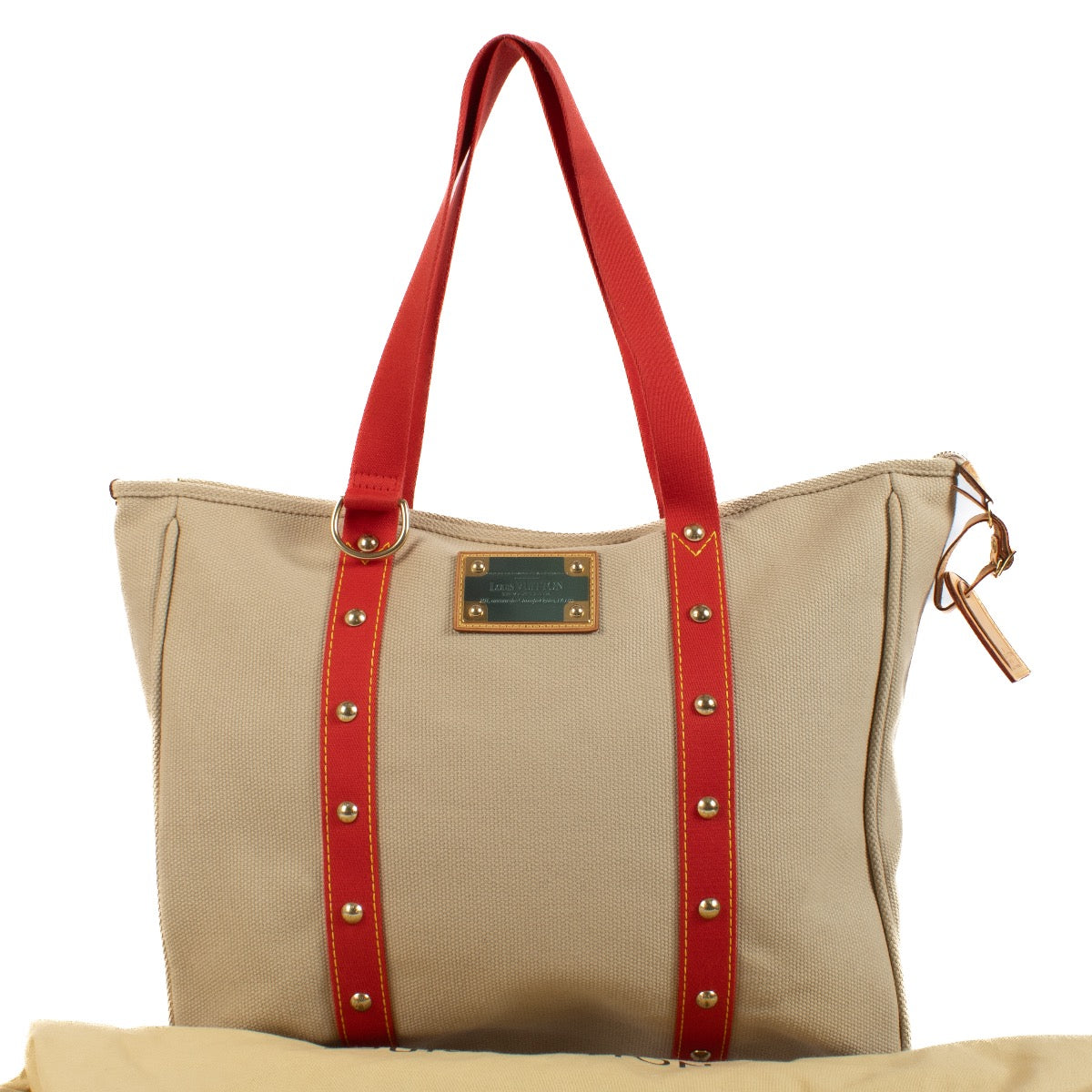 Louis Vuitton Red Beige Cloth Antigua Cabas GM Shoulder Bag for the best price at Labellov secondhand luxury in Antwerp, Brussels, Knokke.