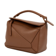 Authentic second hand brand new Loewe Tan Satin Calfskin Puzzle Bag at www.labellov.com