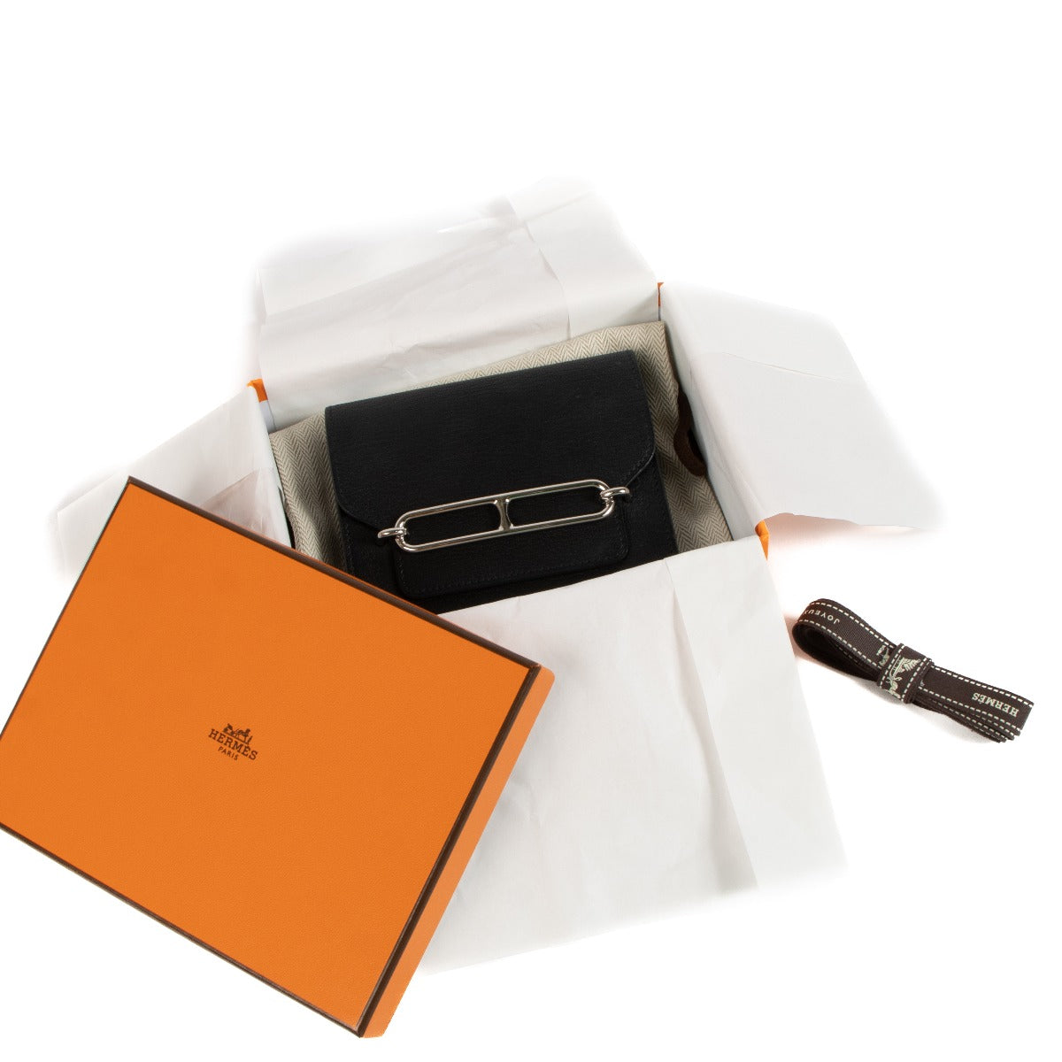 Shop 100% authentic Hermès Black Roulis Slim Wallet at Labellov.com.