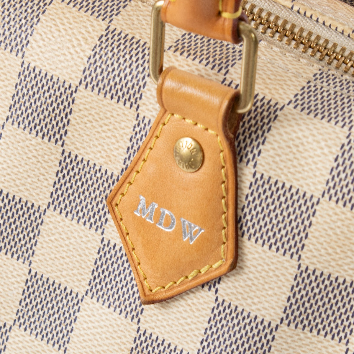 Shop safe online at Labellov in Antwerp, Brussels and Knokke this 100% authentic second hand Louis Vuitton Beige Damier Azur Speedy 30 Top Handle Bag