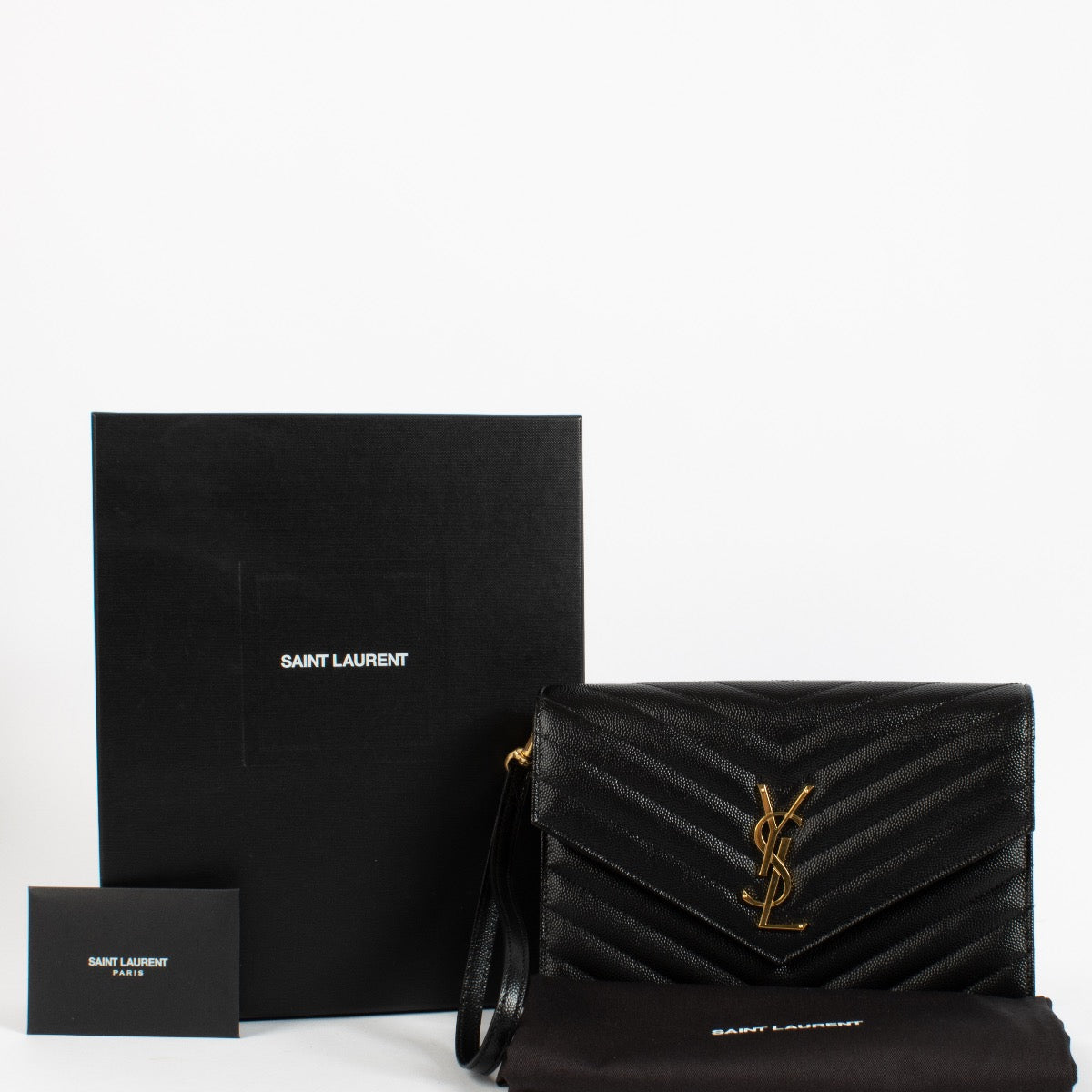 Are you looking for an authentic Saint Laurent Black Matelasse Cassandre Flap Pouch? We buy and sell your preloved designer bags.