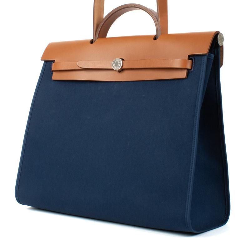 Shop authentic vintage second hand pre-owned Hermès Herbag Zip 39 Bleu De Malte/Fauve Canvas/Hunter Leather on www.labellov.com
