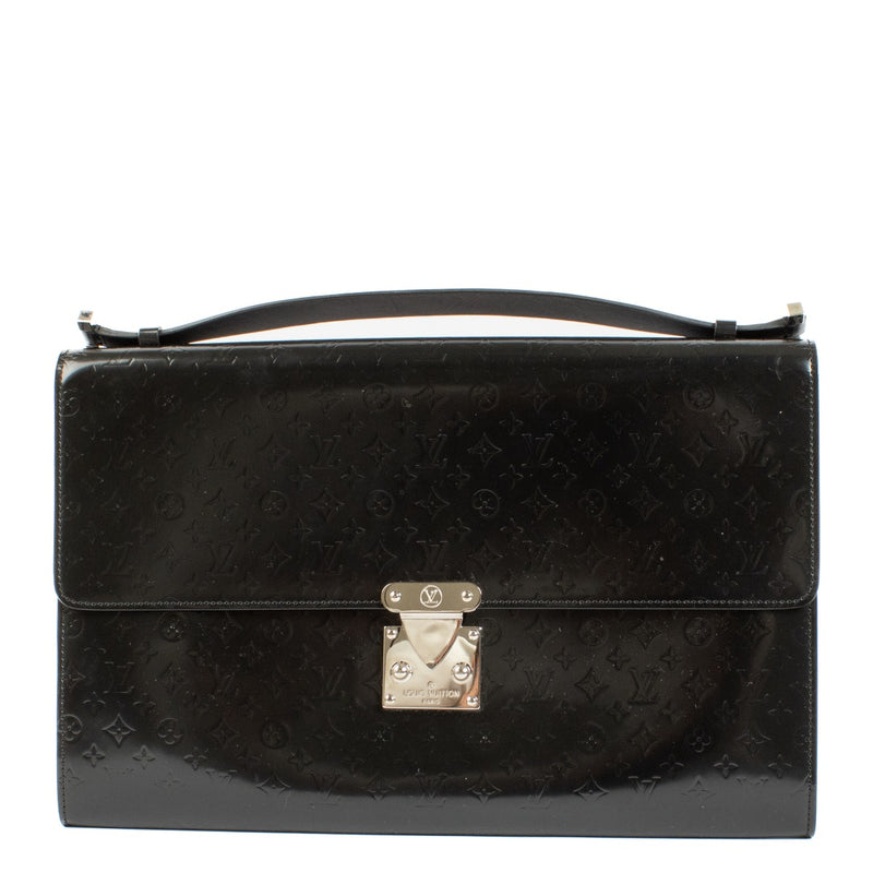 Vintage Louis Vuitton Black Anouchka GM handbag in black monogram-embossed patent leather with silver-tone hardware and push-release closure. Buy now on Labellov.com.