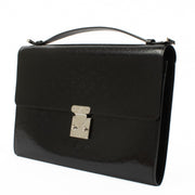 Vintage Louis Vuitton Black Anouchka GM handbag in black monogram-embossed patent leather with silver-tone hardware and push-release closure. Buy now on Labellov.com.