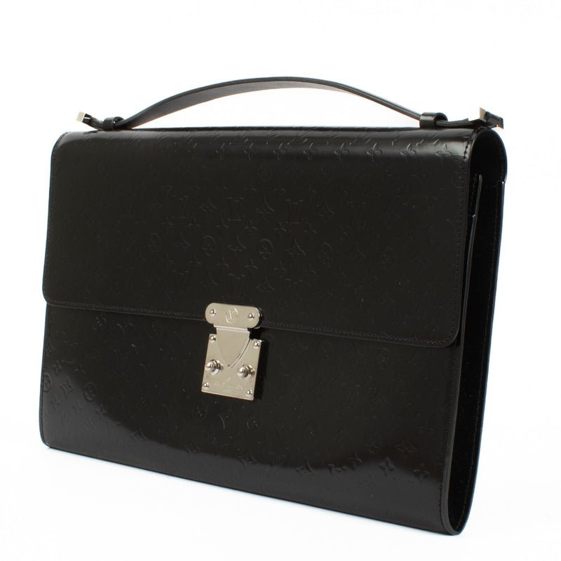 Vintage Louis Vuitton Black Anouchka GM handbag in black monogram-embossed patent leather with silver-tone hardware and push-release closure. Buy now on Labellov.com.