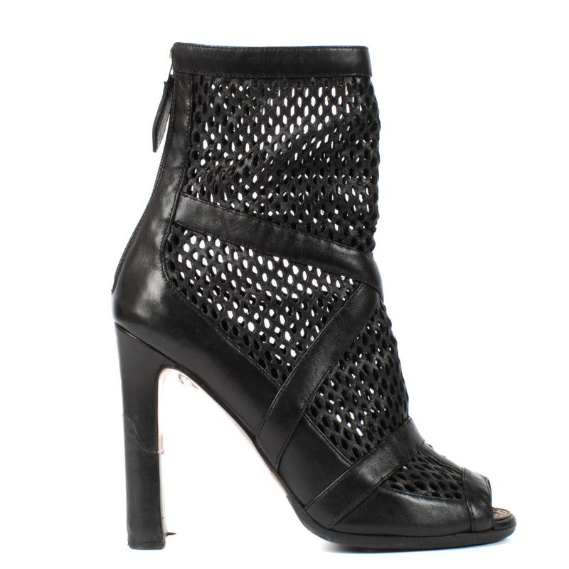 Shop 100% authentic Alaïa Black Cut-out Leather Open Toe Ankle Boots at Labellov.com.