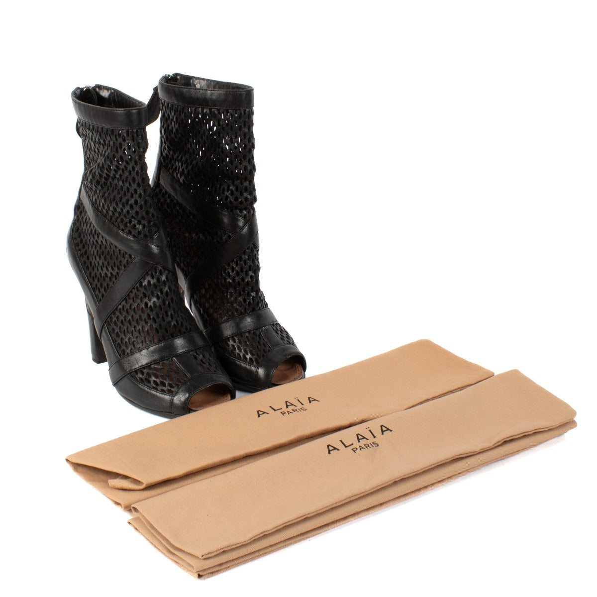 Shop 100% authentic Alaïa Black Cut-out Leather Open Toe Ankle Boots at Labellov.com.