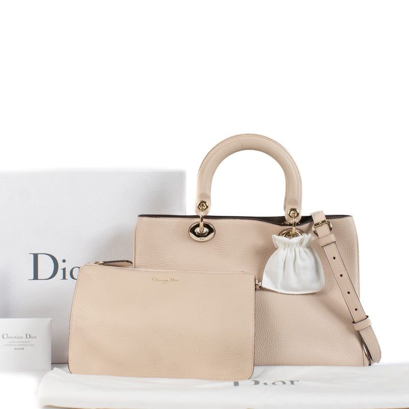 Shop safe online at Labellov in Antwerp, Brussels and Knokke this 100% authentic second hand Christian Dior Pink Grained Leather Medium Diorissimo Bag