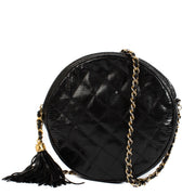 Shop 100% authentic Chanel Shiny Black Lizard Vintage Round Crossbody Bag at Labellov.com.