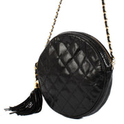Shop 100% authentic Chanel Shiny Black Lizard Vintage Round Crossbody Bag at Labellov.com.