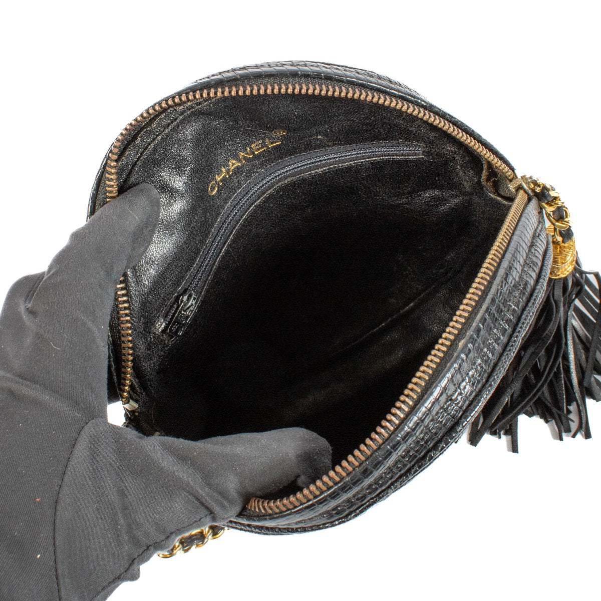 Shop 100% authentic Chanel Shiny Black Lizard Vintage Round Crossbody Bag at Labellov.com.