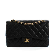 Shop safe online at Labellov in Antwerp and Knokke this 100% authentic second hand Chanel Black Caviar Large Classic Flap Bag