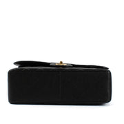 Shop safe online at Labellov in Antwerp and Knokke this 100% authentic second hand Chanel Black Caviar Large Classic Flap Bag