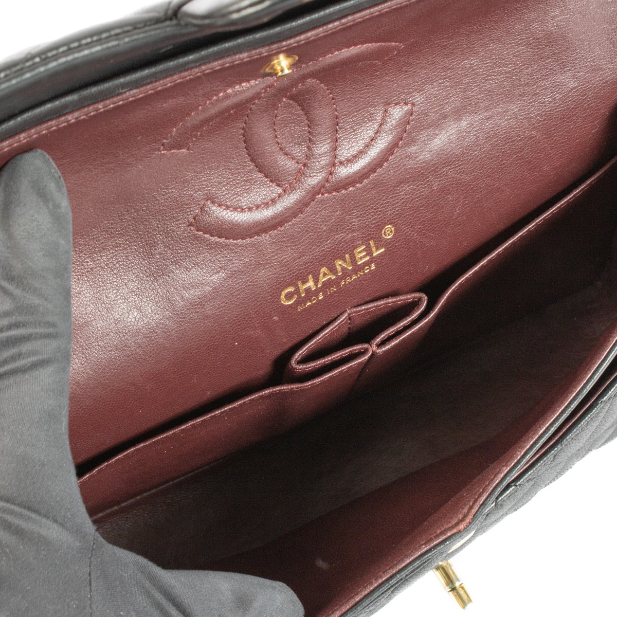 Shop safe online at Labellov in Antwerp, Brussels and Knokke this 100% authentic second hand Chanel Black Lambskin Medium Classic Flap Bag