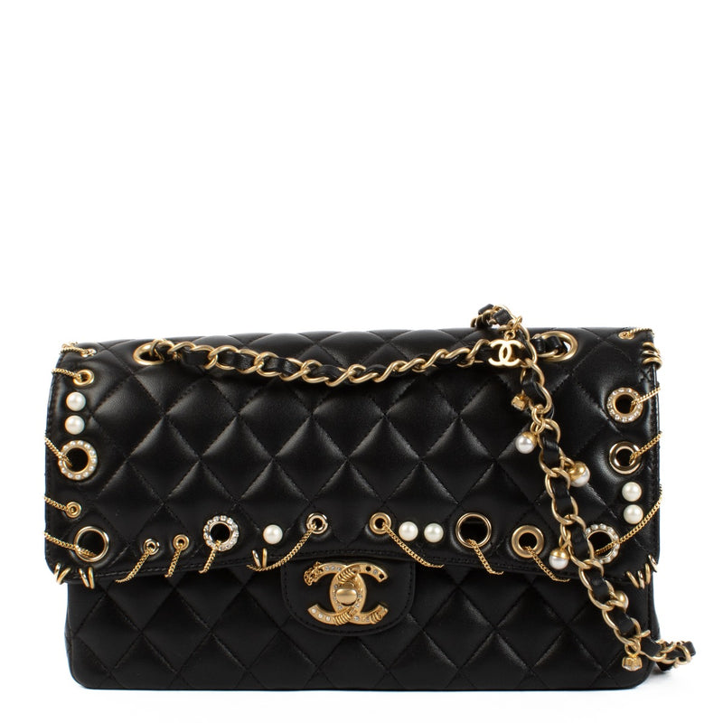 Shop safe online at Labellov in Antwerp, Brussels and Knokke this 100% authentic second hand Chanel Black Lambskin Piercing Classic Flap Bag