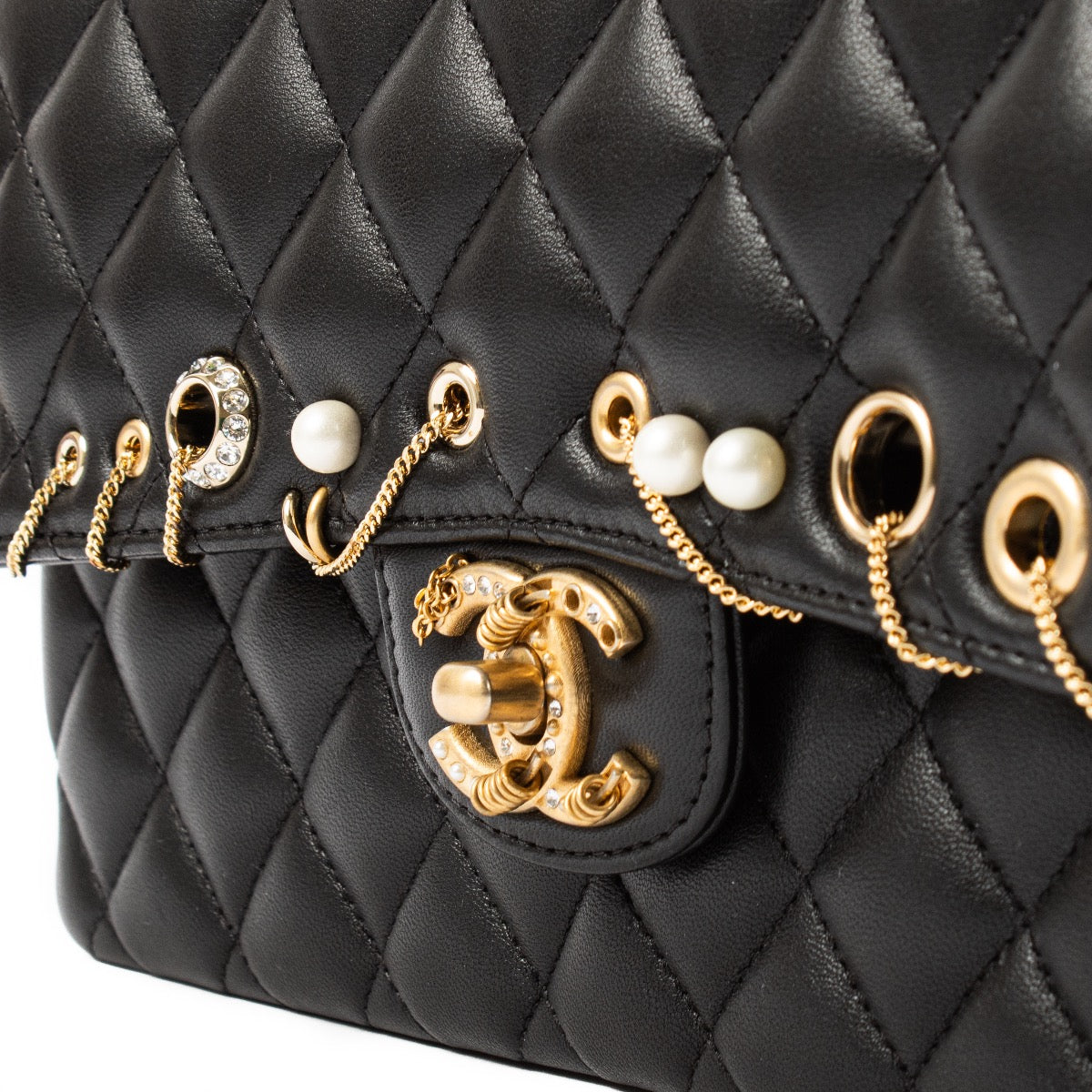Shop safe online at Labellov in Antwerp, Brussels and Knokke this 100% authentic second hand Chanel Black Lambskin Piercing Classic Flap Bag