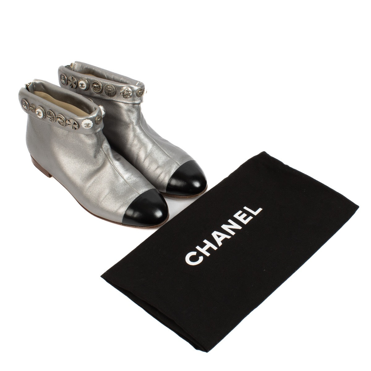 shop 100% authentic second hand Chanel Silver Cap Toe Lucky Charm Button Flat Boots - Size 38 on Labellov.com
