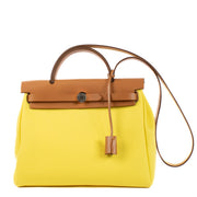 Authentic second hand brand new Hermès Herbag Zip 31 Jaune Citron/Naturel Sable Toile Officier/Hunter on www.labellov.com