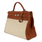 Authentic second hand vintage 2001 Hermès Kelly 40 Ecru/Fauve Crinoline/Barenia PHW on www.labellov.com