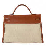 Authentic second hand vintage 2001 Hermès Kelly 40 Ecru/Fauve Crinoline/Barenia PHW on www.labellov.com