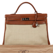 Authentic second hand vintage 2001 Hermès Kelly 40 Ecru/Fauve Crinoline/Barenia PHW on www.labellov.com